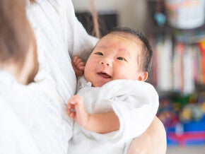 Woman holding a baby