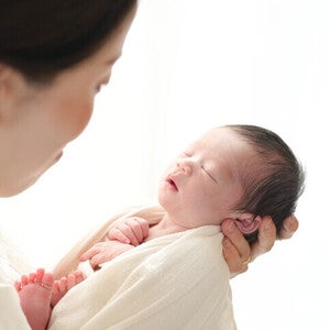 Woman holding a baby