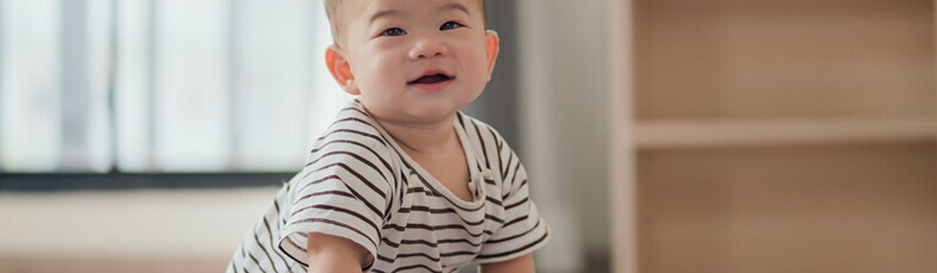 พัฒนาการเด็ก 9 เดือน ทารก 9 เดือน พร้อมวิธีเสริมพัฒนาการลูก